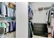 Organized walk-in closet featuring ample hanging space and shelving for optimal storage solutions at 2425 Orofino Ct, Charlotte, NC 28269