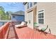 Inviting deck features outdoor seating and a relaxing chaise lounge, perfect for enjoying sunny days at 2425 Orofino Ct, Charlotte, NC 28269