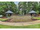 Highland Creek entrance featuring well-manicured landscaping and stone architecture at 2425 Orofino Ct, Charlotte, NC 28269