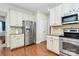 Updated kitchen has stainless appliances, granite countertops and stylish cabinets offer a gourmet cooking experience at 2425 Orofino Ct, Charlotte, NC 28269