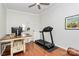 Bright office space featuring hardwood floors and a ceiling fan at 2425 Orofino Ct, Charlotte, NC 28269