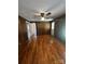Spacious living room with hardwood floors, wood paneling and ample natural light at 3253 Centergrove Rd, Kannapolis, NC 28083