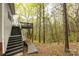 Back of house showing backyard with multiple decks at 3505 Mayspring Pl, Charlotte, NC 28269