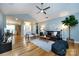 Bright living room with hardwood floors, vaulted ceilings, contemporary furnishings, and ample natural light at 3505 Mayspring Pl, Charlotte, NC 28269