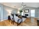 Spacious living room showcasing a vaulted ceiling, fireplace, modern furnishings, and ample natural light at 3505 Mayspring Pl, Charlotte, NC 28269