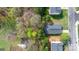Aerial view of property with a green fenced yard surrounded by trees at 3944 Hemingway Nw Dr, Hickory, NC 28601