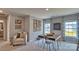 Bright bonus room featuring stylish decor, a unique table, and plenty of natural light at 4025 Cramer Estates Ct, Gastonia, NC 28056