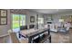 Open-concept dining area leads to a spacious living room with a fireplace at 4025 Cramer Estates Ct, Gastonia, NC 28056