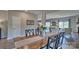 The dining room features a wooden table with seating for six at 4025 Cramer Estates Ct, Gastonia, NC 28056