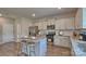 Modern kitchen with stainless steel appliances, granite countertops, and island with seating at 4025 Cramer Estates Ct, Gastonia, NC 28056
