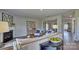 Bright living room boasts a fireplace, modern decor, and seamless access to other rooms at 4025 Cramer Estates Ct, Gastonia, NC 28056
