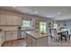 Open concept kitchen and dining area. The kitchen has granite countertops and stainless steel appliances at 4025 Cramer Estates Ct, Gastonia, NC 28056