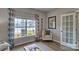 Cozy sitting room with a patterned chair, soft rug, and bright window at 4025 Cramer Estates Ct, Gastonia, NC 28056