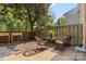 Private backyard with a patio area, perfect for outdoor seating and enjoying the serene surroundings at 4607 Hedgemore Dr # D, Charlotte, NC 28209