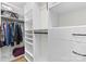Organized closet space with hanging rods, shelving, and drawers to maximize storage, keeping clothes and accessories neatly arranged at 4607 Hedgemore Dr # D, Charlotte, NC 28209