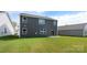 Large backyard features lush green grass, perfect for outdoor activities and relaxation at 4610 Harris Elliot Rd, Lincolnton, NC 28092