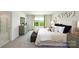 Tranquil bedroom with neutral tones, plush bedding, and a view to the outdoors at 4610 Harris Elliot Rd, Lincolnton, NC 28092