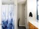 Bathroom with a blue patterned shower curtain, adding a splash of color at 5015 Drake Pond Ln, Rock Hill, SC 29732