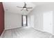 Bedroom featuring a ceiling fan, window with curtains and a gray carpet at 5015 Drake Pond Ln, Rock Hill, SC 29732
