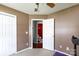 Bedroom leading to a bathroom, enhanced with modern lighting and closet space at 5015 Drake Pond Ln, Rock Hill, SC 29732