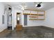 The garage has storage shelves and an open doorway at 5015 Drake Pond Ln, Rock Hill, SC 29732