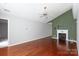 Bright living room features a fireplace and hardwood floors at 5015 Drake Pond Ln, Rock Hill, SC 29732
