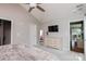 Bright and airy main bedroom featuring neutral tones, modern furniture and a TV creating a serene atmosphere at 5015 Drake Pond Ln, Rock Hill, SC 29732