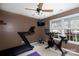 Home workout area featuring a treadmill, stationary bike, and a ceiling fan at 5015 Drake Pond Ln, Rock Hill, SC 29732
