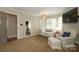 Bright bedroom with a seating area and great natural light, creating a cozy retreat at 6910 Green Turtle Dr, Charlotte, NC 28210