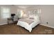 Comfortable bedroom featuring a desk, chair, and neutral tones, perfect for a relaxing retreat or office space at 6910 Green Turtle Dr, Charlotte, NC 28210