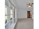 Bright bedroom featuring a ceiling fan and large windows at 70 Liberty Church Rd, Taylorsville, NC 28681