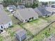 Aerial view of home with a large, fenced backyard and covered patio in a community at 7633 Tanglewood Way, Denver, NC 28037