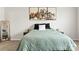 Inviting bedroom with mountain art above the bed, soft carpet, and a full-length mirror at 7633 Tanglewood Way, Denver, NC 28037