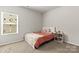 Bright bedroom with neutral carpet and plenty of natural light at 7633 Tanglewood Way, Denver, NC 28037
