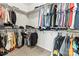 Walk-in closet with custom shelving and ample storage space at 7633 Tanglewood Way, Denver, NC 28037