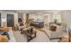 Open-concept living space seamlessly connects the living room, dining area, and kitchen island at 8025 Cliffside Dr, Charlotte, NC 28270