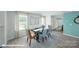 Stylish dining room featuring a modern table, elegant chairs, and bright natural light at 818 N Naughton St, Chester, SC 29706