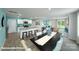 Open floor plan showcasing kitchen island with barstool seating and view into living room at 818 N Naughton St, Chester, SC 29706
