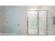 Bathroom featuring a modern shower with a glass enclosure, shelving, and modern fixtures at 818 N Naughton St, Chester, SC 29706