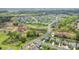 Aerial view of the neighborhood with lush green surroundings, streets, and homes at 8715 Gladden Hill Ln, Fort Mill, SC 29715