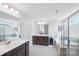 Bathroom featuring a stand-up shower, a soaking tub, and a modern double vanity at 8715 Gladden Hill Ln, Fort Mill, SC 29715