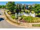 Beautiful community entrance with signage, landscaping, and lush green surroundings at 8715 Gladden Hill Ln, Fort Mill, SC 29715