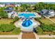 Resort-style community pool with a splash area and covered seating for residents at 8715 Gladden Hill Ln, Fort Mill, SC 29715