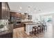 Modern kitchen featuring stainless steel appliances, a center island, and stylish pendant lighting at 8715 Gladden Hill Ln, Fort Mill, SC 29715