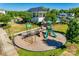 Community playground with slides and climbing equipment, perfect for Gathering fun and recreation at 8715 Gladden Hill Ln, Fort Mill, SC 29715
