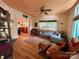 Comfortable living room with hardwood floors, large windows, and a cozy seating area, perfect for relaxing at 1000 Margaret Brown St, Charlotte, NC 28202