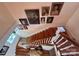 Elegant staircase with hardwood steps and white railings, providing a clear view and architectural detail at 1000 Margaret Brown St, Charlotte, NC 28202