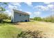 Backyard view of a two-story home with green grass at 101 Glencroft Dr, Wingate, NC 28174