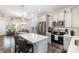 Modern kitchen featuring stainless steel appliances and a central island at 101 Glencroft Dr, Wingate, NC 28174