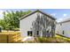 Exterior of the home with a view of backyard, fence and sliding door at 1032 Dooley Dr, Charlotte, NC 28227